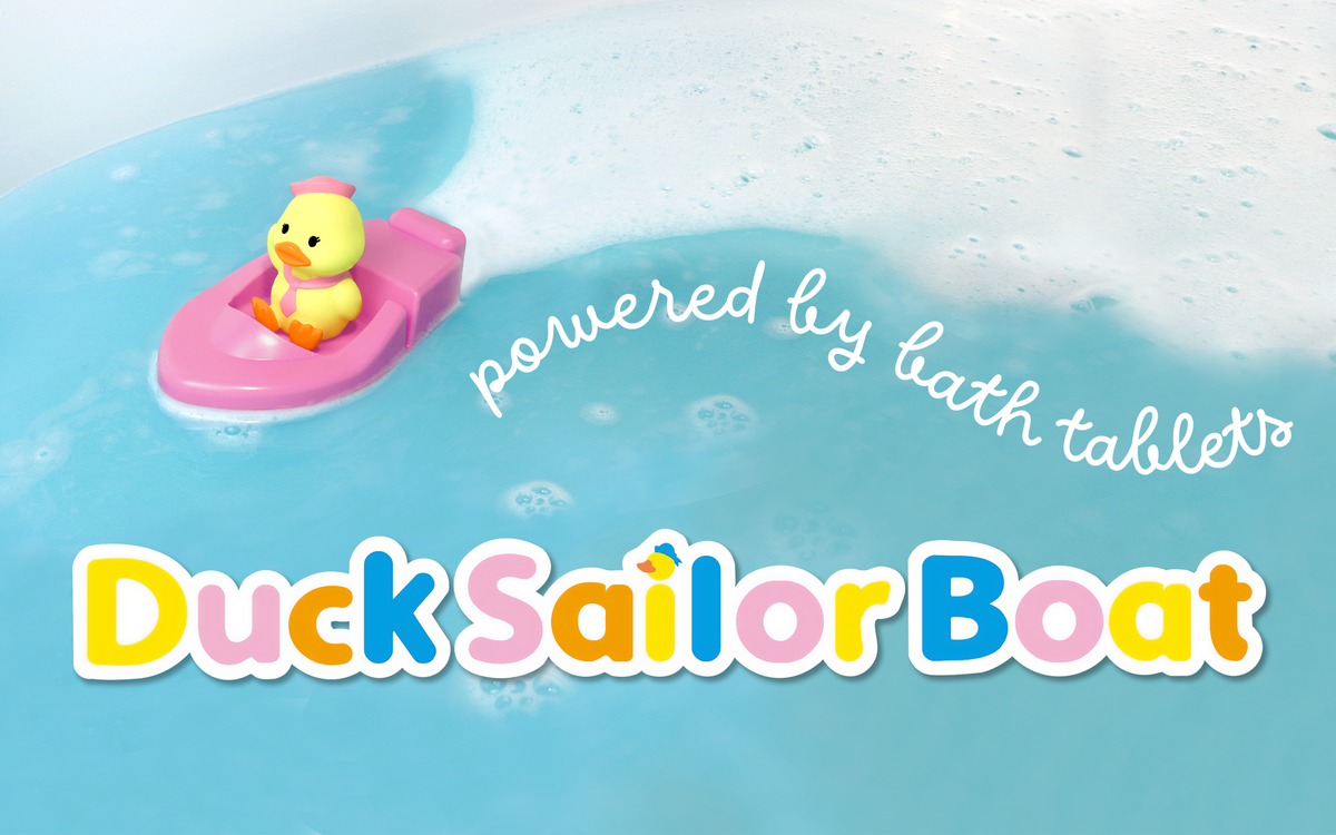 banner image for duck sailor boat featuring pink variant with the cursive text "powered by bath tablets" over the title DUCK SAILOR BOAT