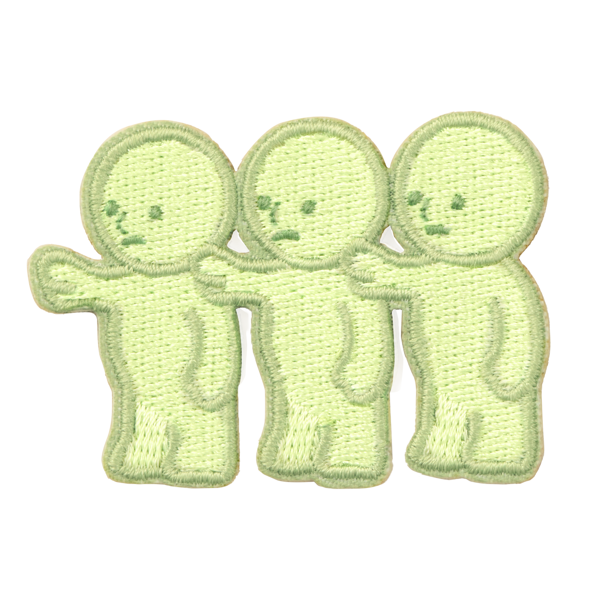 Little sticker variant- three SMISKI face left with their hands on each others right shoulder. Left most SMISKI is reaching out with its hand